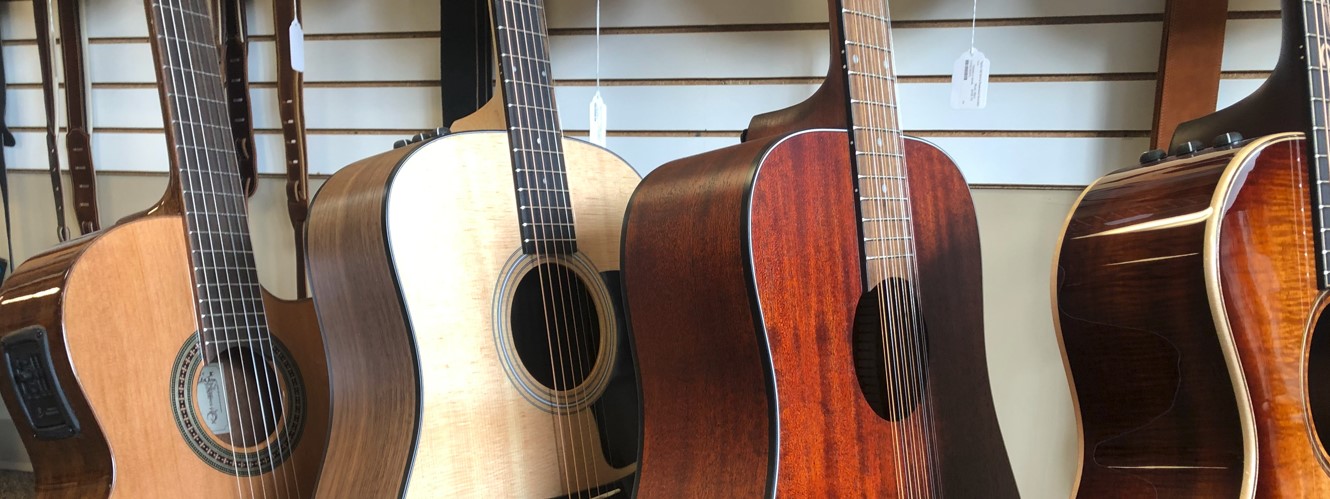 Different woods used for acoustic guitars
